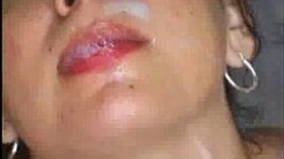 Hot brunette blowing two cocks - porn video